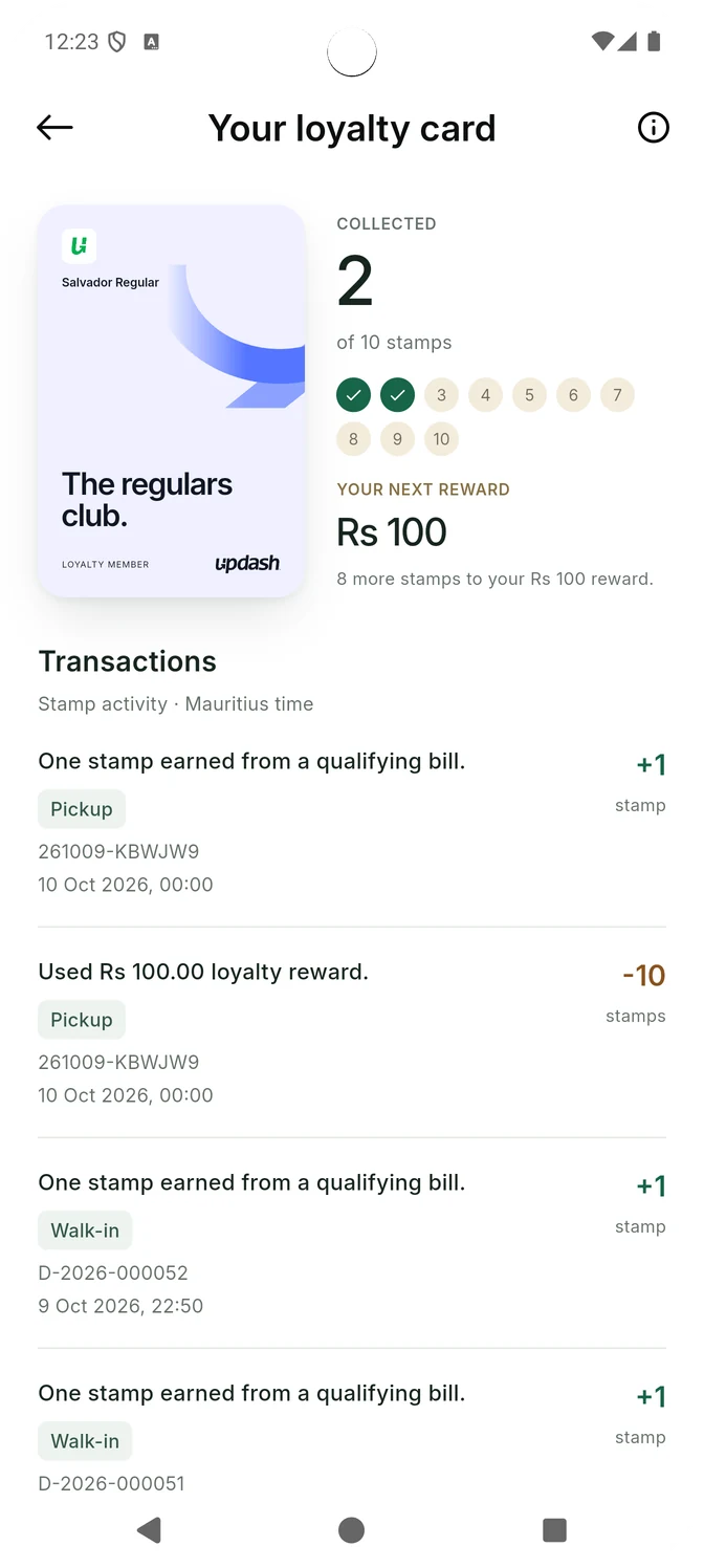 Customer loyalty card in the Updash app, showing 2 of 10 stamps collected, a Rs 100 next reward and transaction history.